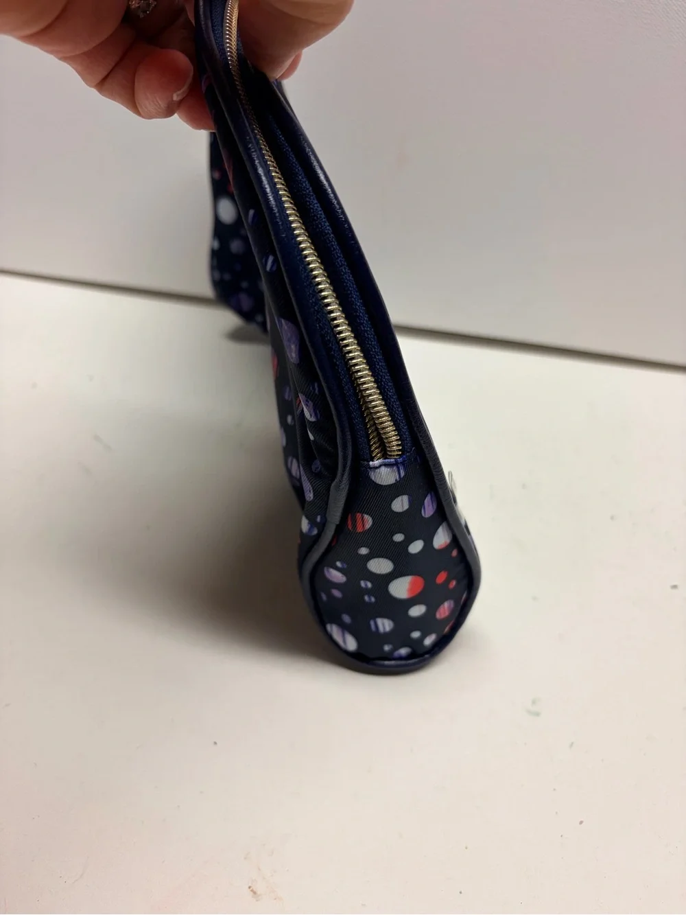 Adrienne Vittadini Navy Cosmetic Bag with Multicolor Dot Pattern